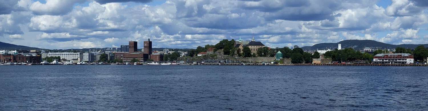 Oslo's harbour from the fjord, with the City Hall towers and Akershus Fortress